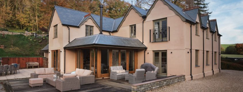 Wooden Extension Wooden Extension with a slate grey roof.